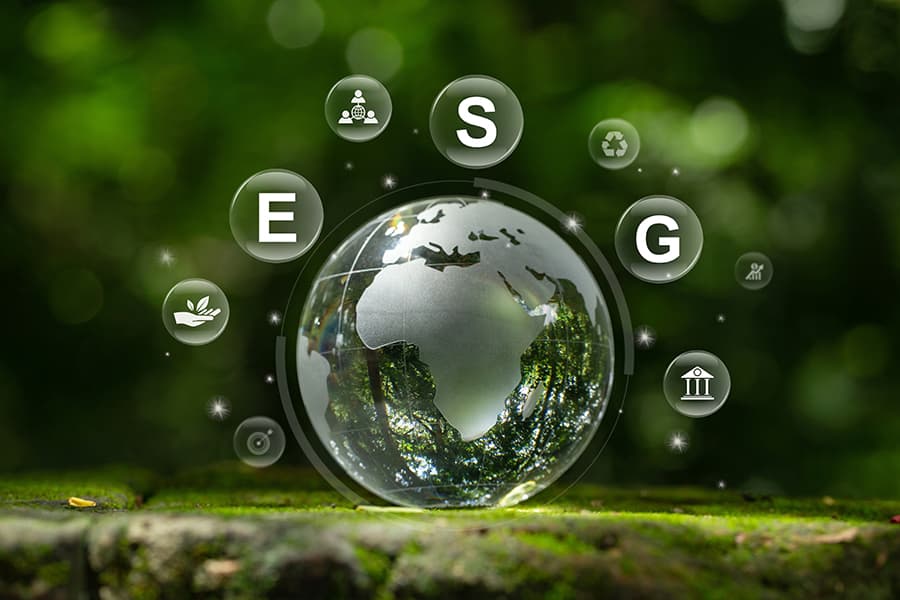 ESG sustainability globe surrounded by environmental, social and governance symbols